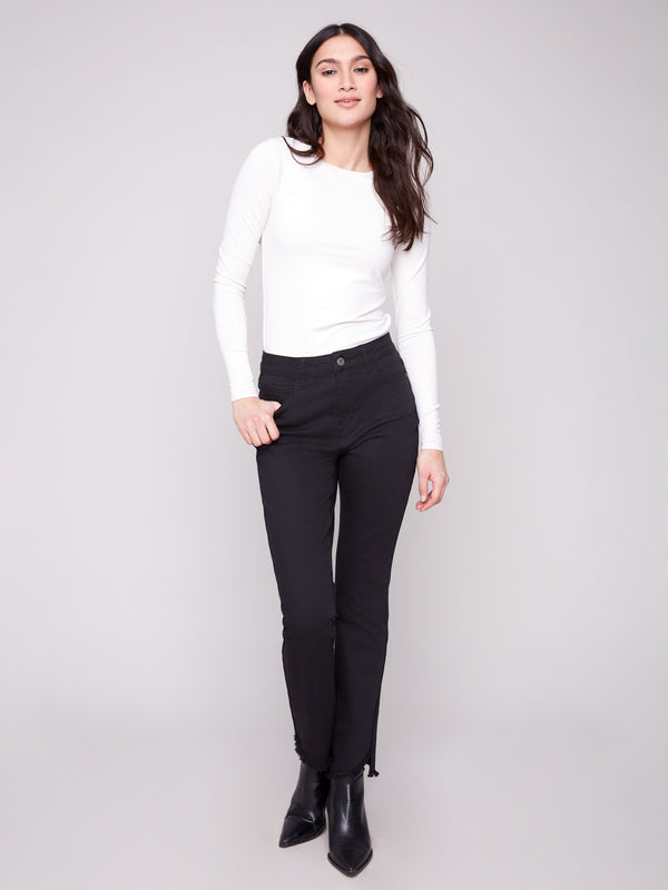 Chic bootcut fit black pants designed with an asymmetrical hem and long-lasting fabric quality by Charlie B.