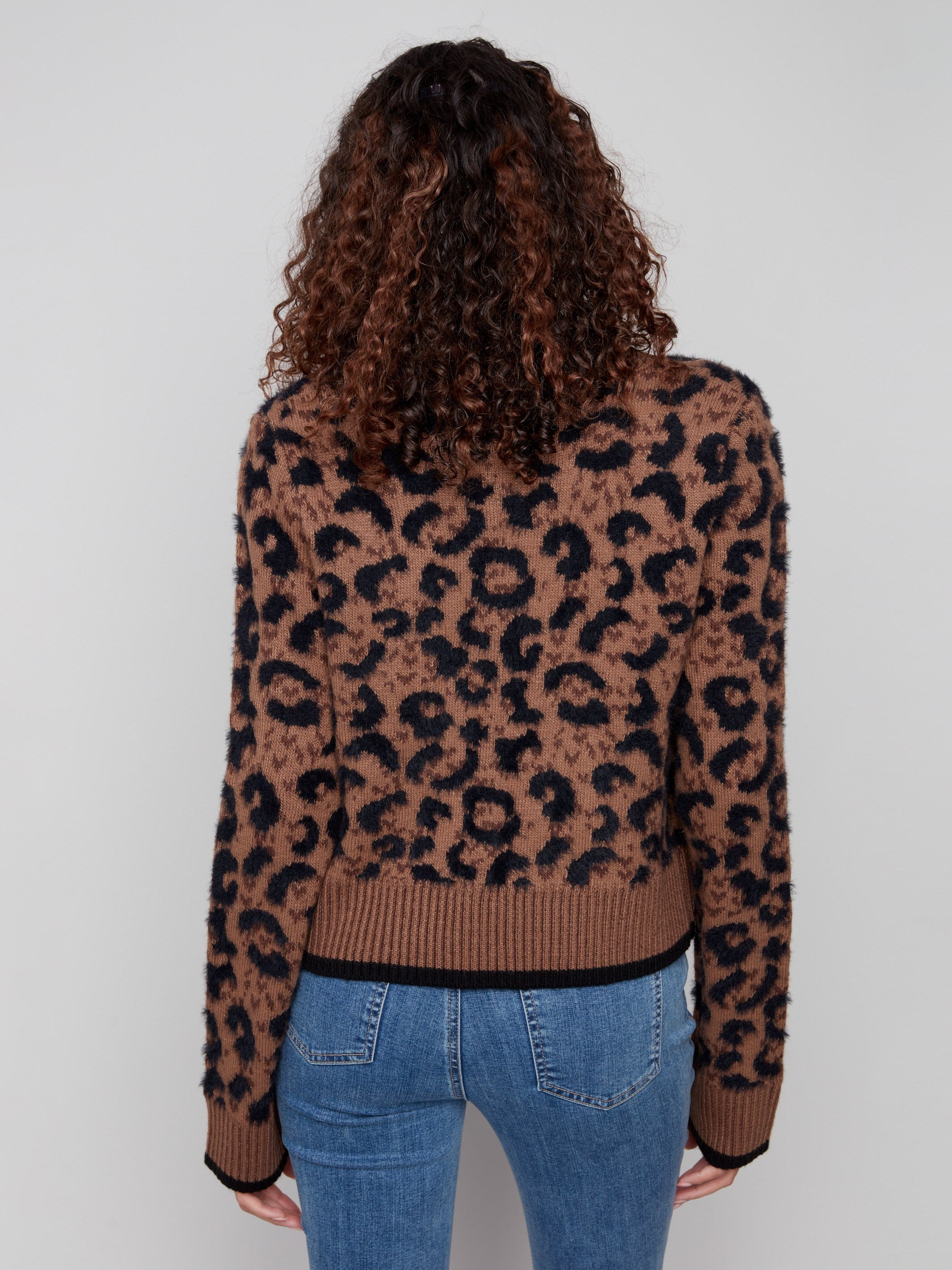Stylish plushy cardigan with elegant bow tie closure accent by Charlie B.