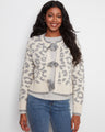 Leopard print cardigan with a crew neckline, featuring elegant tie-front bows for added style. Made by Charlie B.