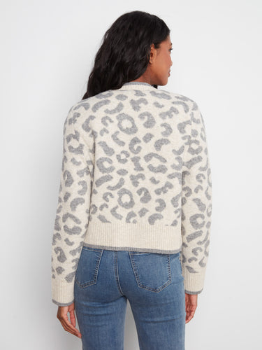 Elegant and cozy cardigan with distinctive tie-front bows, perfect for adding charm to any outfit. By Charlie B.