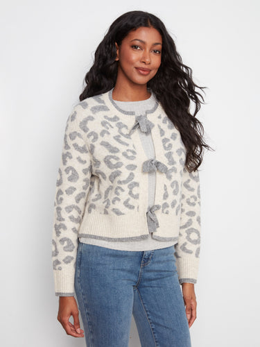 Fashionable jacquard knit cardigan with a classic crew neckline and stylish leopard patterning. Created by Charlie B.