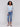 Denim sweater showcasing elegant long sleeves by Charlie B.