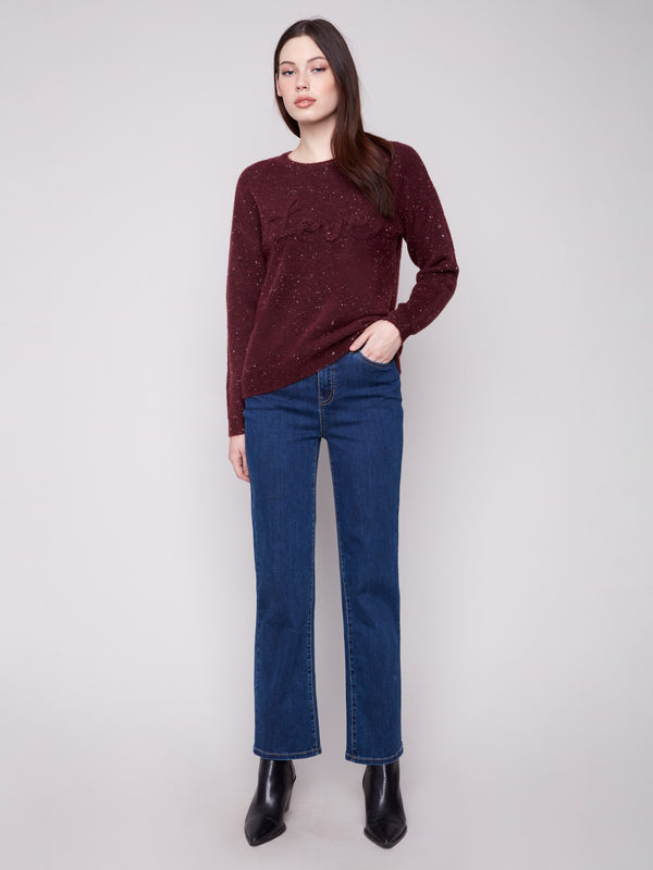 Stylish cabernet sweater with a speckled pattern and drop shoulder design, perfect for any casual outing by Charlie B.