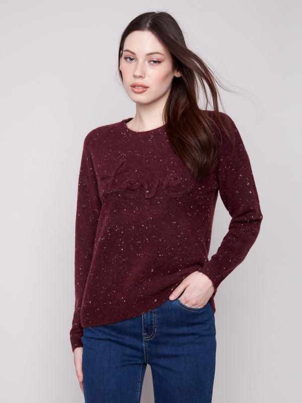 Chic cabernet sweater with a drop shoulder design and speckled texture, offering both style and comfort by Charlie B.