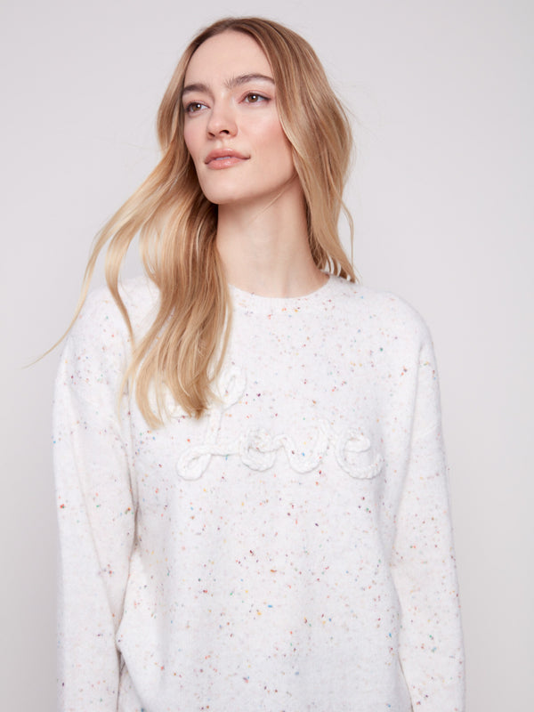 Sweater featuring a delightful speckled pattern and long sleeves, perfect for cozy days by Charlie B.