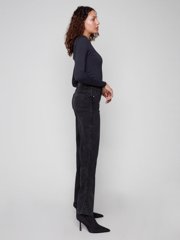 These charcoal jeans showcase a long length design, perfect for versatile styling by Charlie B.