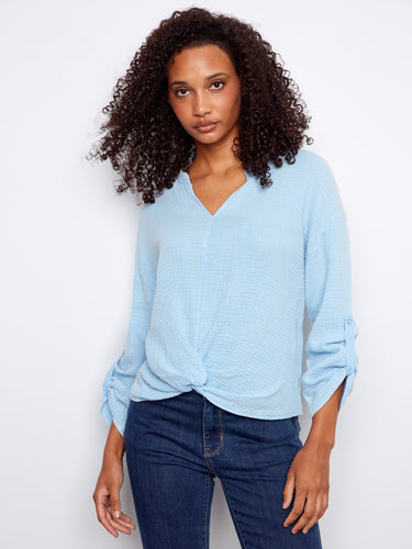 Elegant front knot detail on this light blue top, made from soft 100% cotton material by Charlie B.