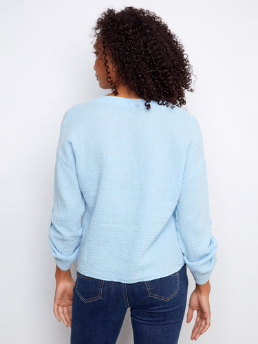 Casual light blue top in breathable 100% cotton, perfect for any occasion with its relaxed fit by Charlie B.