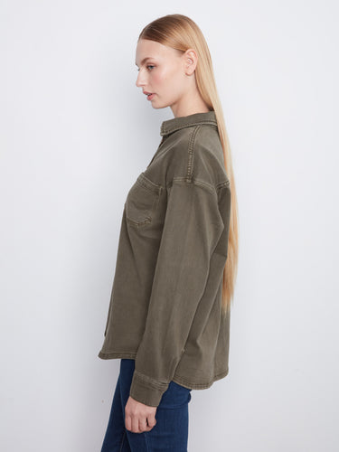 A convenient chest pocket enhances the functionality and style of this chic button-front shirt by Charlie B.