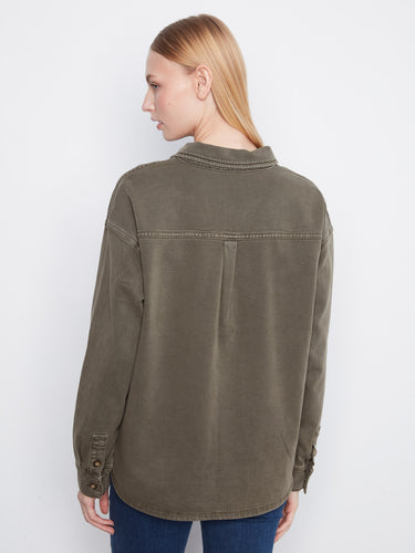 The button-front closure adds a timeless appeal to this fashionable long-sleeve shirt by Charlie B.
