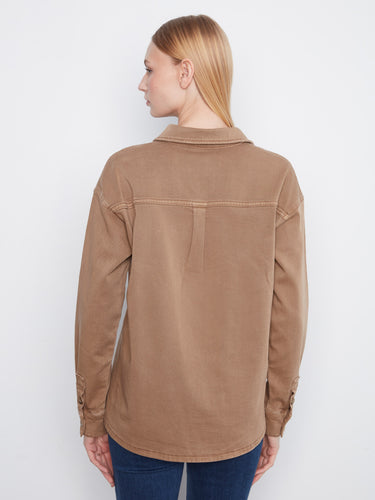 Button-front closure gives this piece a structured look while maintaining its laid-back appeal, ideal for layering. By Charlie B.