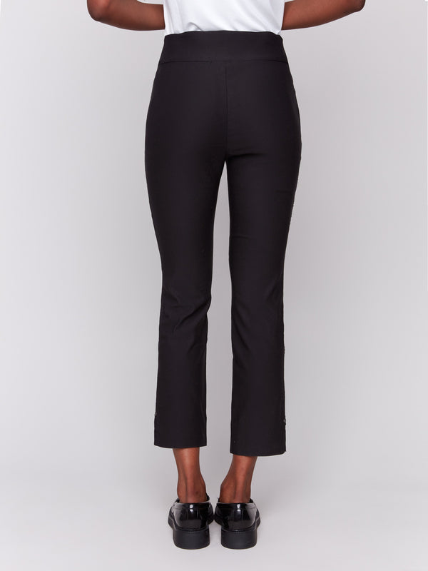 Black capri pants with hem slit and side pockets by Charlie B.