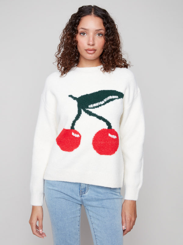 Intarsia knit sweater in white, highlighted by its plush texture and fun cherries by Charlie B.