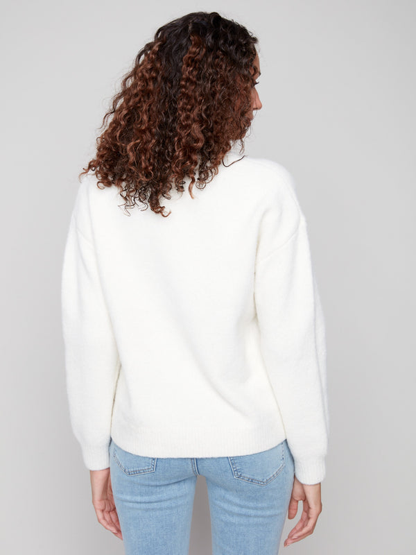 Cozy plush textured sweater in white with a cherry print by Charlie B.