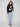 Stylish black sweater with plush texture and cherry intarsia for cozy elegance by Charlie B.