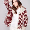 Chevron Boucle Jacket with button closure, adding a stylish touch to any outfit. Features faux sherpa details for warmth by Charlie B.