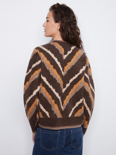Brown sweater showcasing a crew neck and unique chevron pattern by Charlie B.