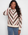 Sweater with a classic crew neck design, featuring bold chevron patterns in earthy tones. Perfect for casual outings. By Charlie B.