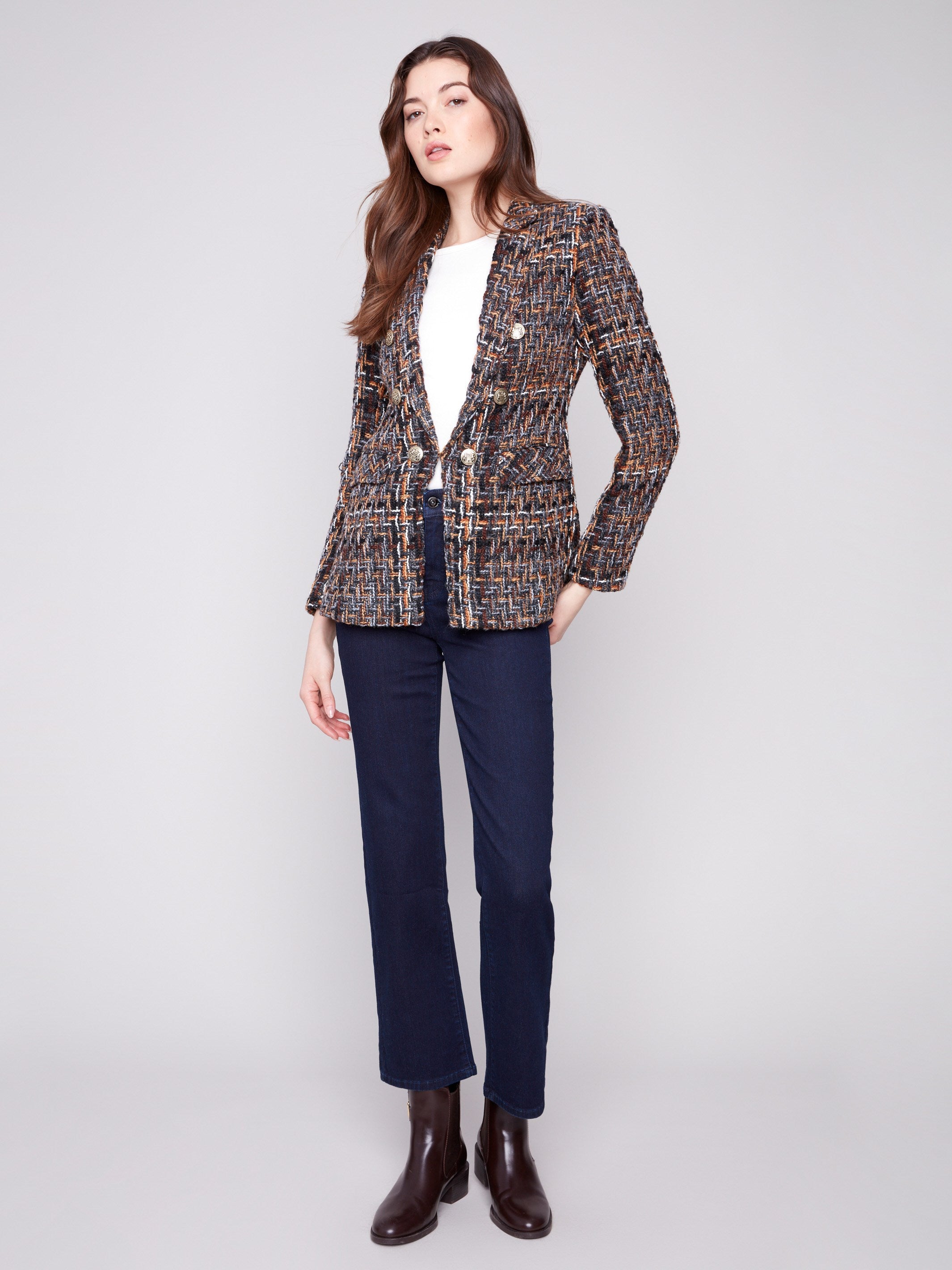 Elegant blazer with hook-and-eye front closure in chic chevron tweed, ideal for any occasion by Charlie B.