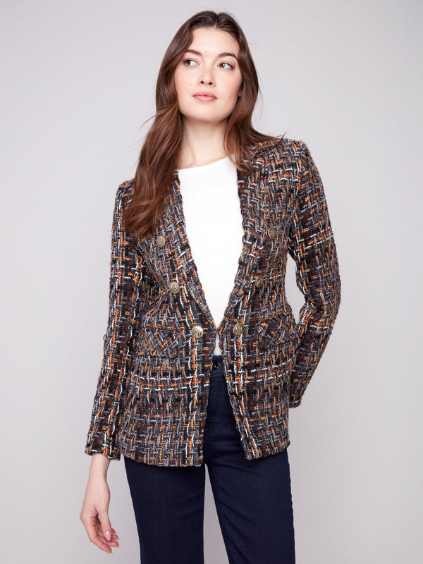 Fashion-forward women's blazer with functional flap pockets in luxurious chevron tweed by Charlie B.