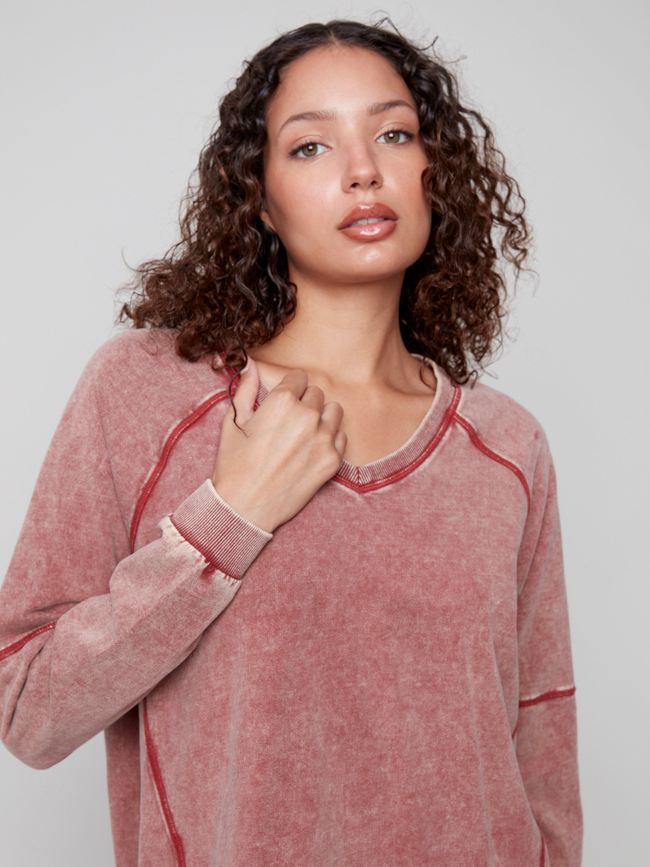 Raglan sleeves enhance the Cabernet V-neck top's sporty yet stylish appearance by Charlie B.