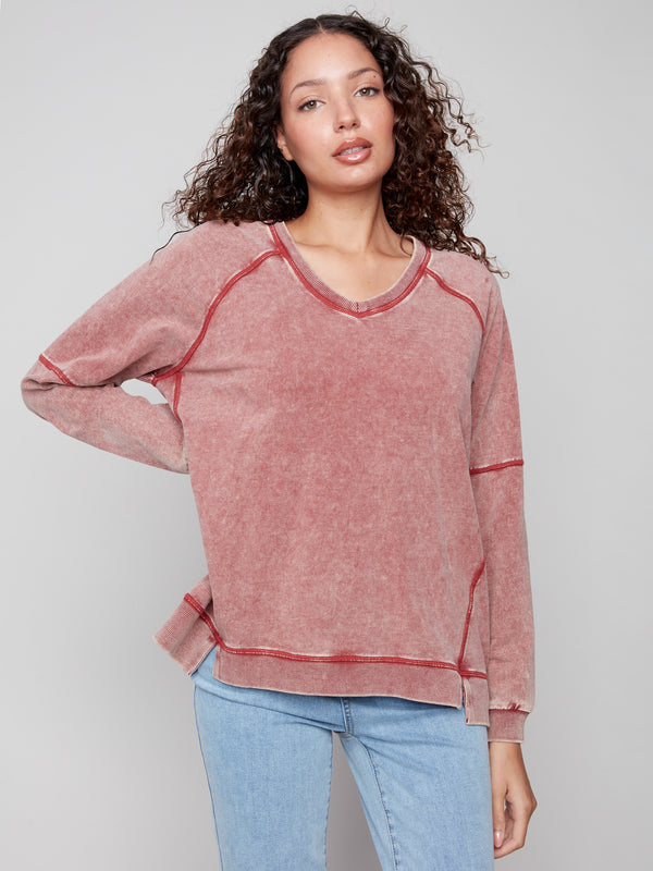 Relaxed fit in Cabernet hue, this V-neck top is perfect for effortless style and comfort by Charlie B.