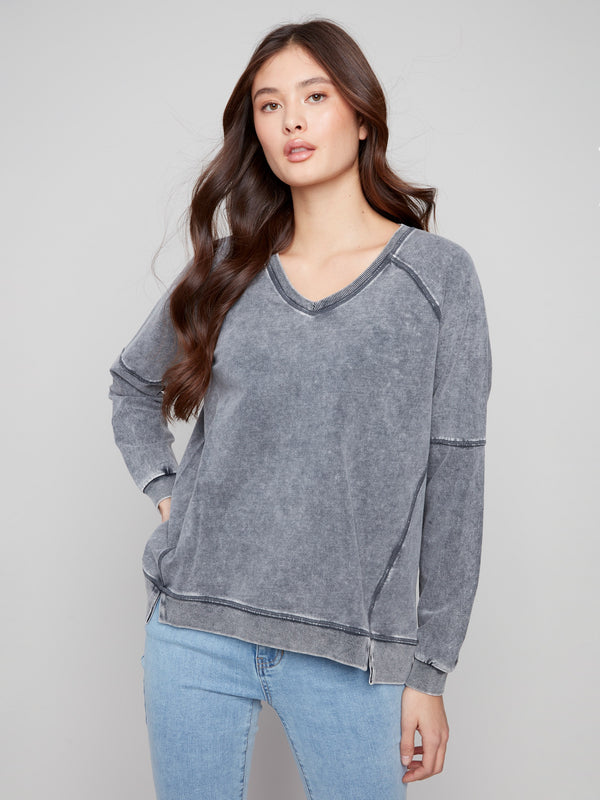 Charcoal V-neck top featuring a relaxed fit, perfect for a laid-back yet stylish look by Charlie B.