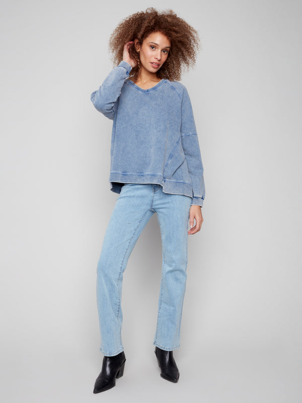 Stylish denim top with washed effect, adding a unique touch to your casual wardrobe by Charlie B.