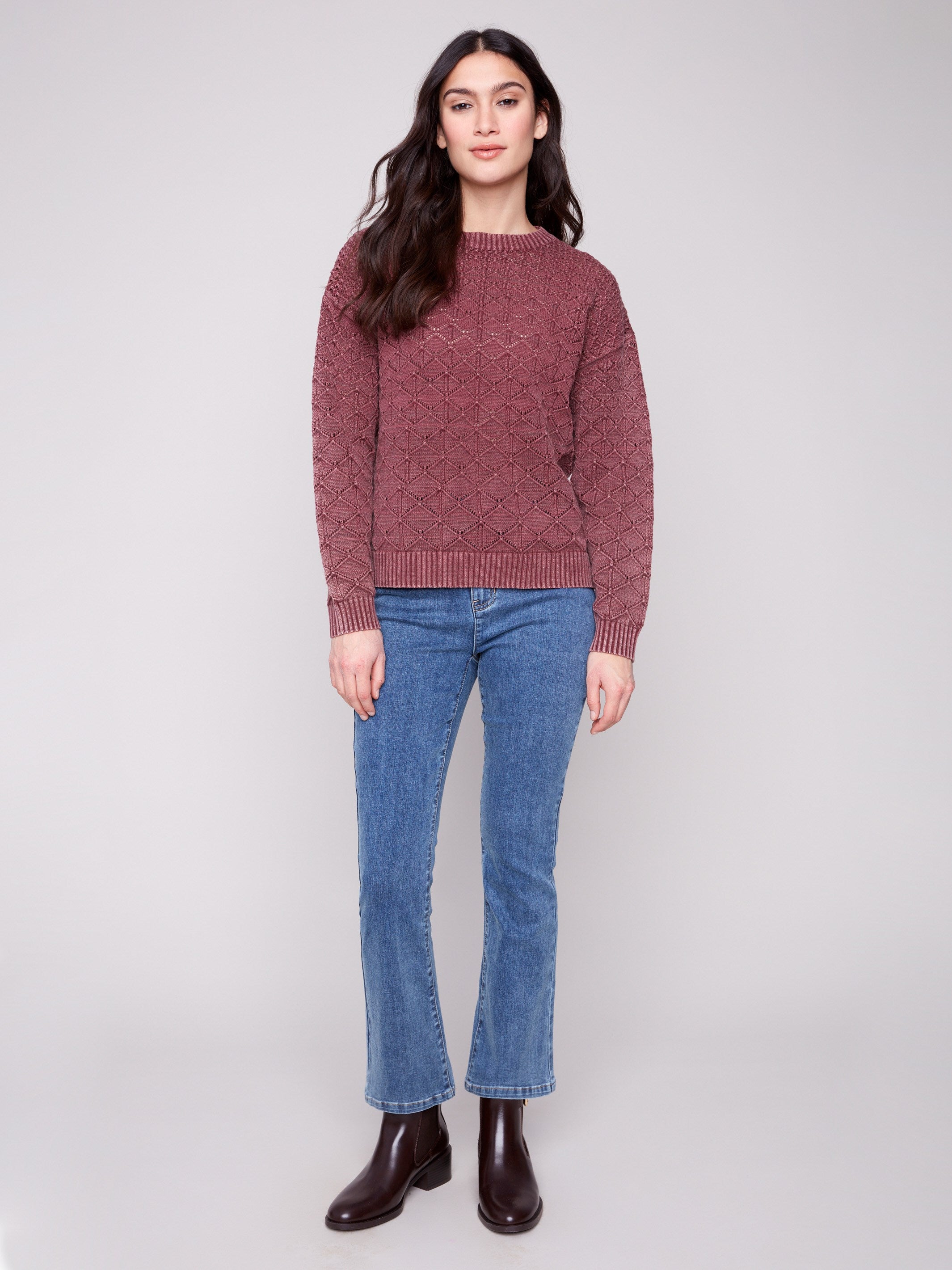 Long-sleeve pointelle sweater with stylish drop shoulders for added comfort by Charlie B.