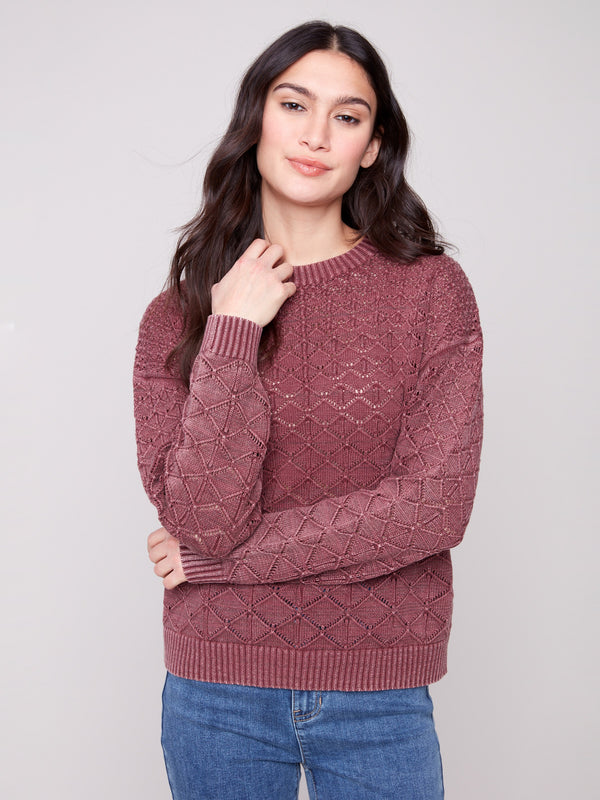Stylish long-sleeve sweater with ribbed cuffs and hem, enhancing its casual charm by Charlie B.
