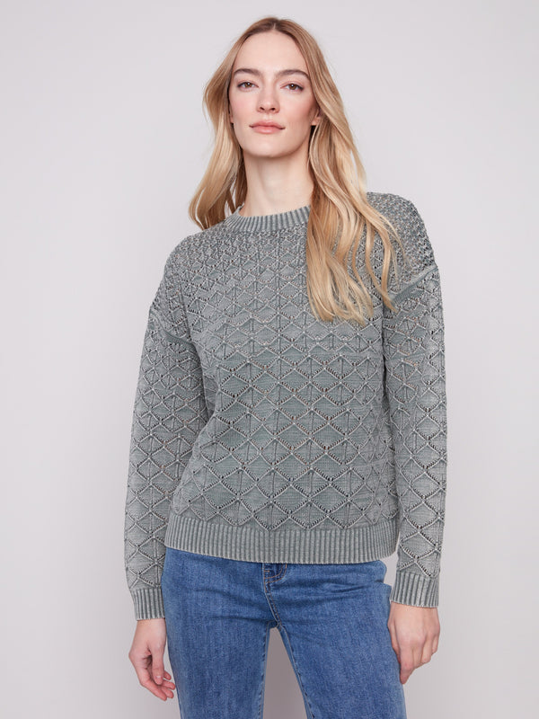 Spruce pointelle sweater featuring a cozy crew neck and classic drop shoulders, perfect for layering by Charlie B.