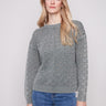 Spruce pointelle sweater featuring a cozy crew neck and classic drop shoulders, perfect for layering by Charlie B.