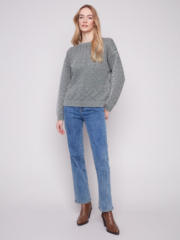 Chic long-sleeve sweater with intricate pointelle pattern and comfortable crew neck, ideal for any occasion by Charlie B.