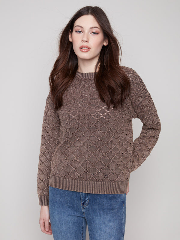 Mocha sweater with drop shoulders and intricate pointelle design, adding a relaxed elegance to any outfit by Charlie B.