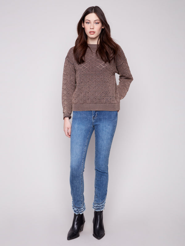 This mocha sweater features a stylish crew neck and drop shoulders, perfect for casual chic looks by Charlie B.