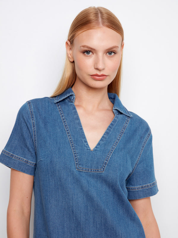 This relaxed fit denim dress offers comfort and effortless style for everyday wear. By Charlie B.