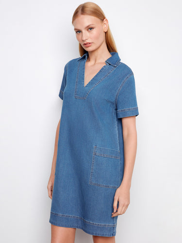 Knee-length denim dress with practical patch pockets, combining functionality and fashion. By Charlie B.