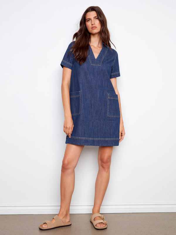 Knee-length denim dress with practical patch pockets, combining style and utility in one chic piece by Charlie B.