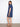 Featuring a collared V-neck, this knee-length dress offers both sophistication and ease for everyday wear by Charlie B.