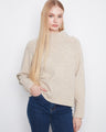Sweater with a cozy mock neck and soft texture, perfect for cooler days. Finished elegantly by Charlie B.