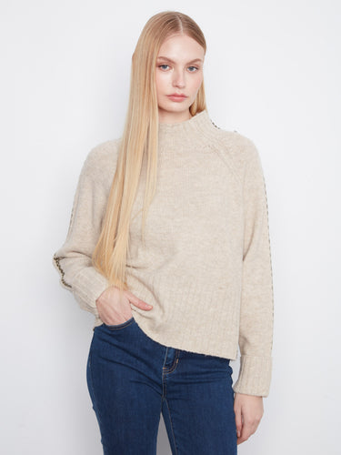 Sweater with a cozy mock neck and soft texture, perfect for cooler days. Finished elegantly by Charlie B.