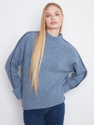Cozy sweater featuring a mock neck design, perfect for chilly days. Styled by Charlie B.