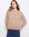 This sweater features a classic crew neckline, offering timeless style and comfort. By Charlie B.