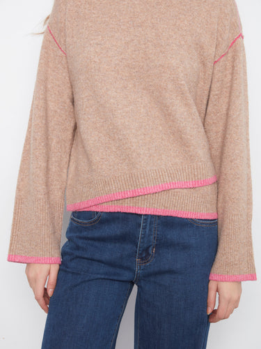 Drop shoulders provide a relaxed fit, perfect for casual outings and everyday wear. By Charlie B.