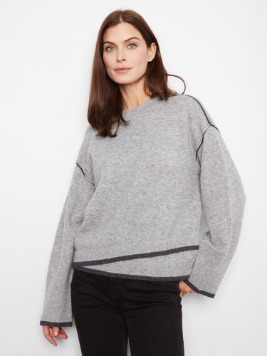 Gray sweater featuring a crew neckline and drop shoulders, offering a relaxed fit with contrast trim for added style by Charlie B.