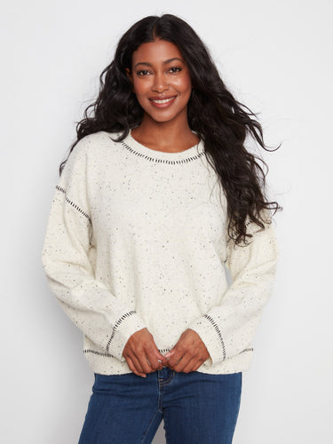 Sweater with a crew neckline and subtle speckled texture, perfect for casual outings. Made from soft fabric for added comfort by Charlie B.