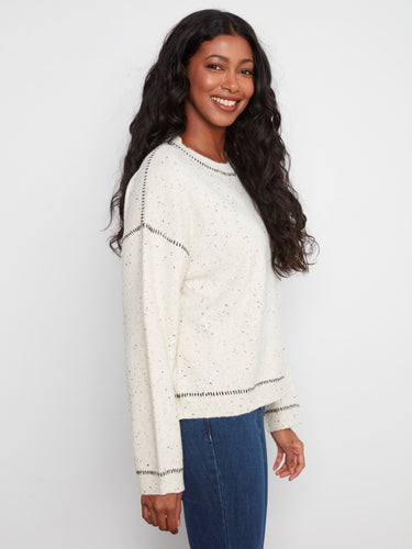 Long sleeves provide warmth and style in this versatile sweater. Perfect for transitioning between seasons with ease by Charlie B.