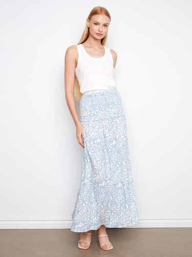 Elegant and adaptable, this piece transforms from skirt to dress effortlessly. Highlighting its removable straps by Charlie B.