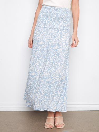 Midi-length style in light blue with floral patterns adds elegance and versatility to your wardrobe options by Charlie B.