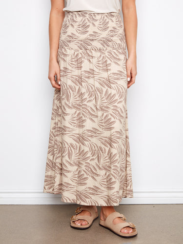 This elegant design showcases the ability to switch between skirt and dress effortlessly. By Charlie B.
